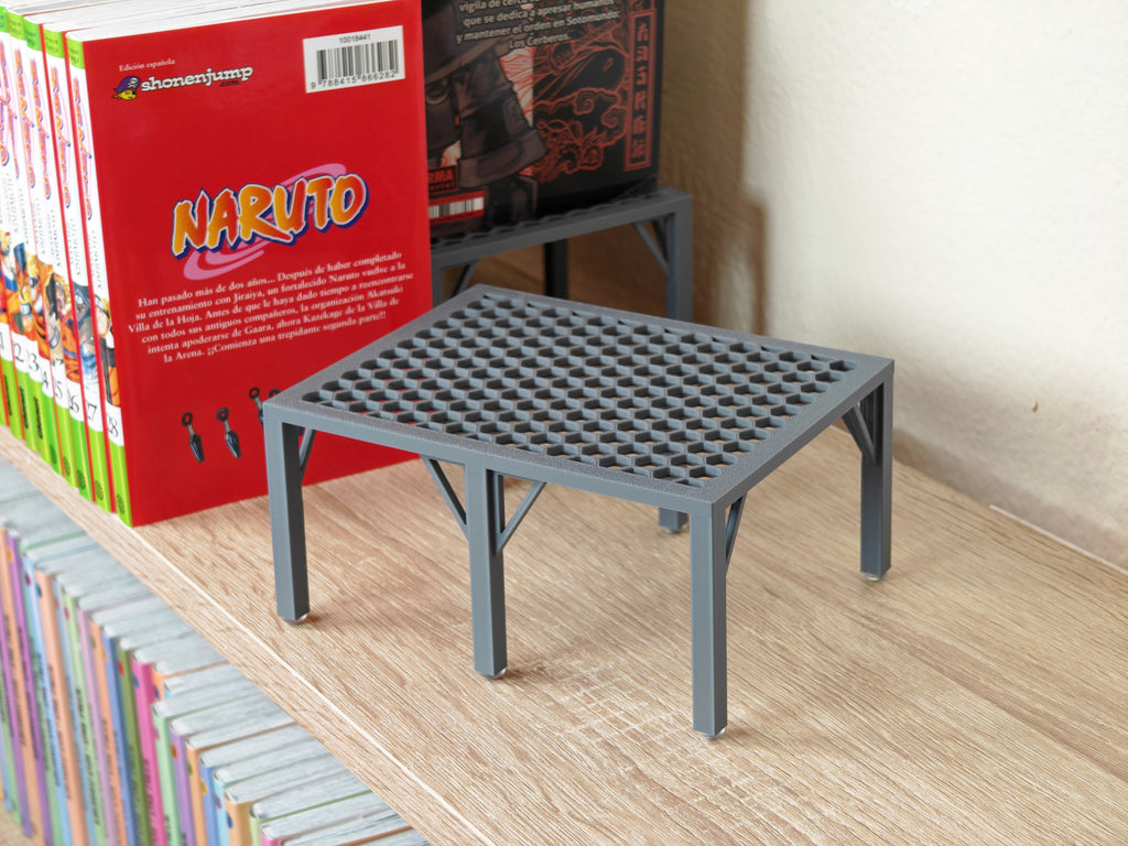 Elevador para mangas y libros