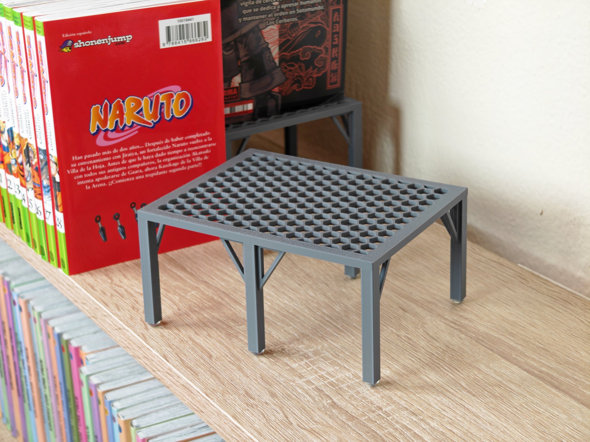 Elevador para mangas y libros