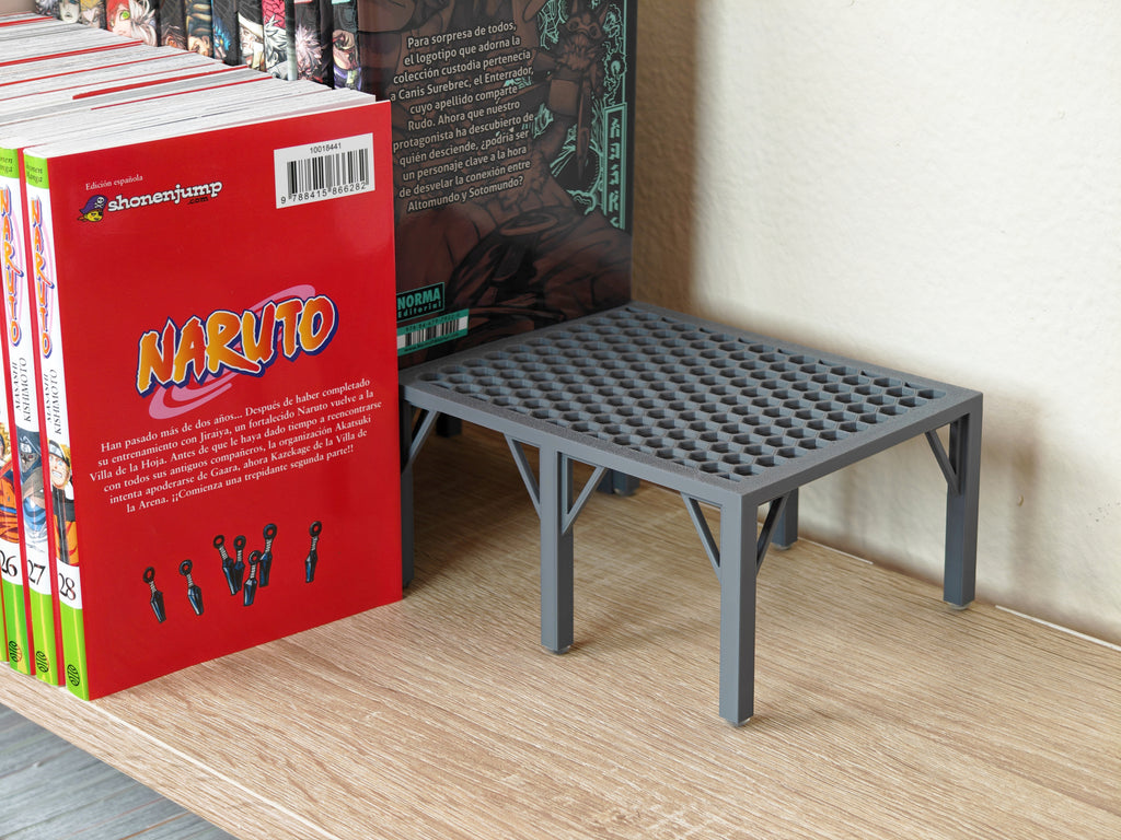 Elevador para mangas y libros