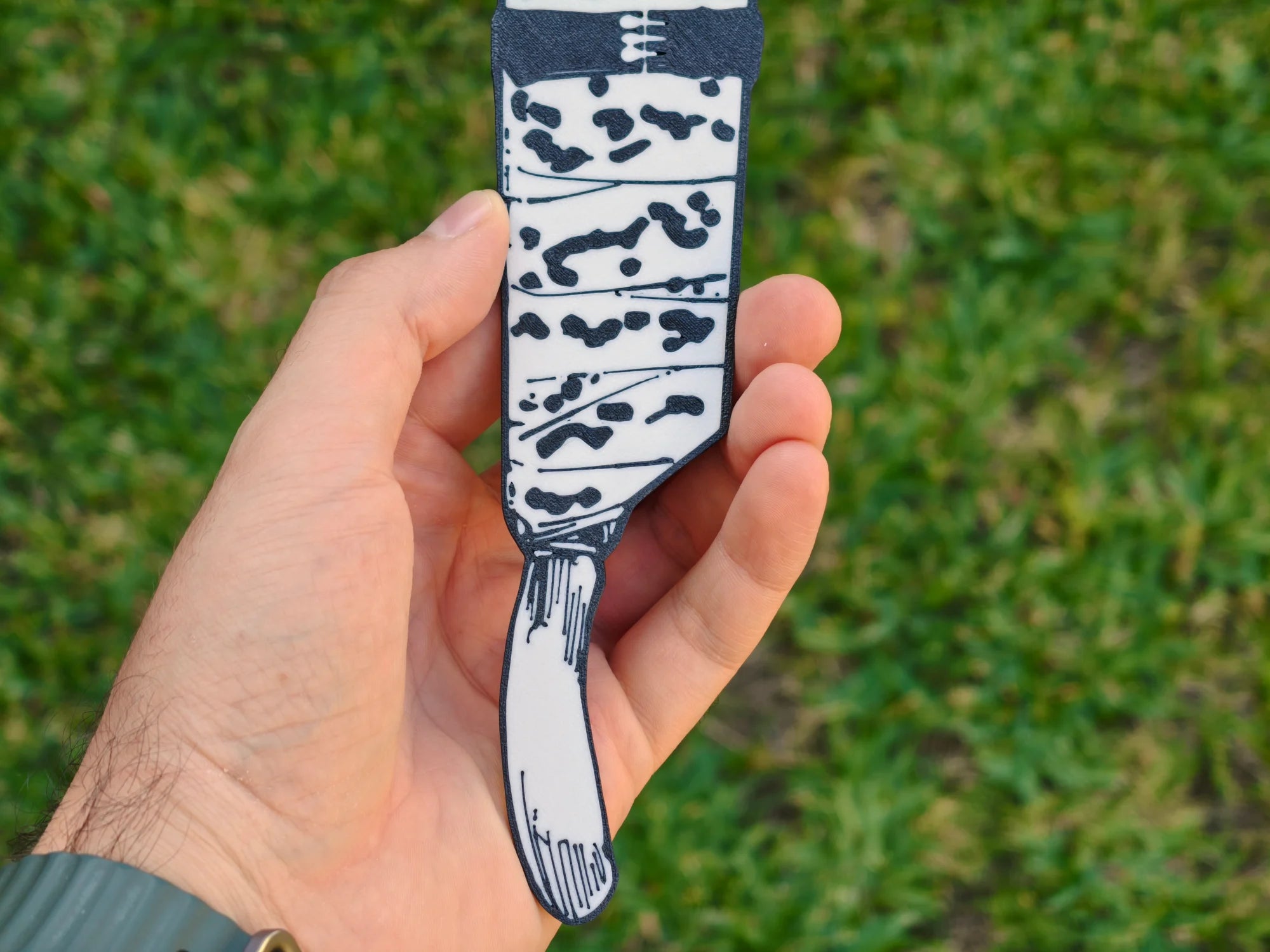 Marcapáginas del arma de Nanami