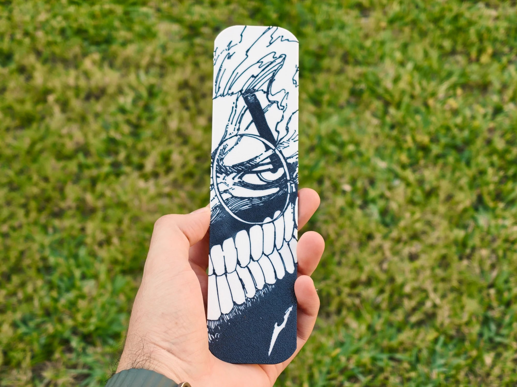 Marcapáginas de Okarun transformado