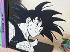 Sujetalibros de Son Goku haciendo OK