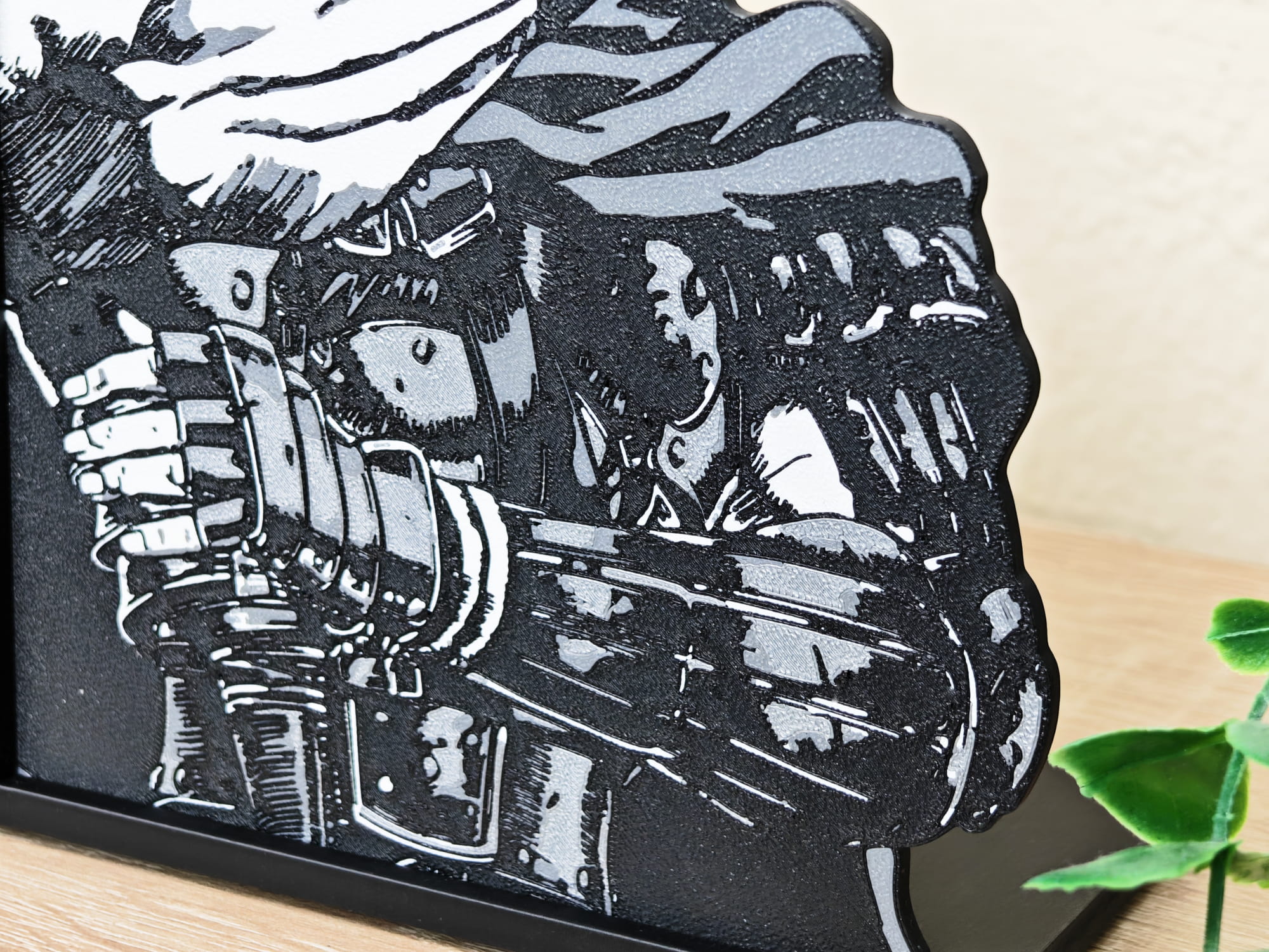 Sujetalibros de Guts de joven