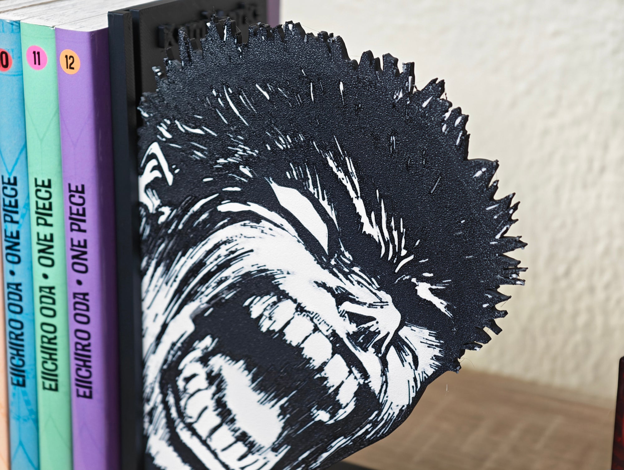 Sujetalibros de la Furia de Guts