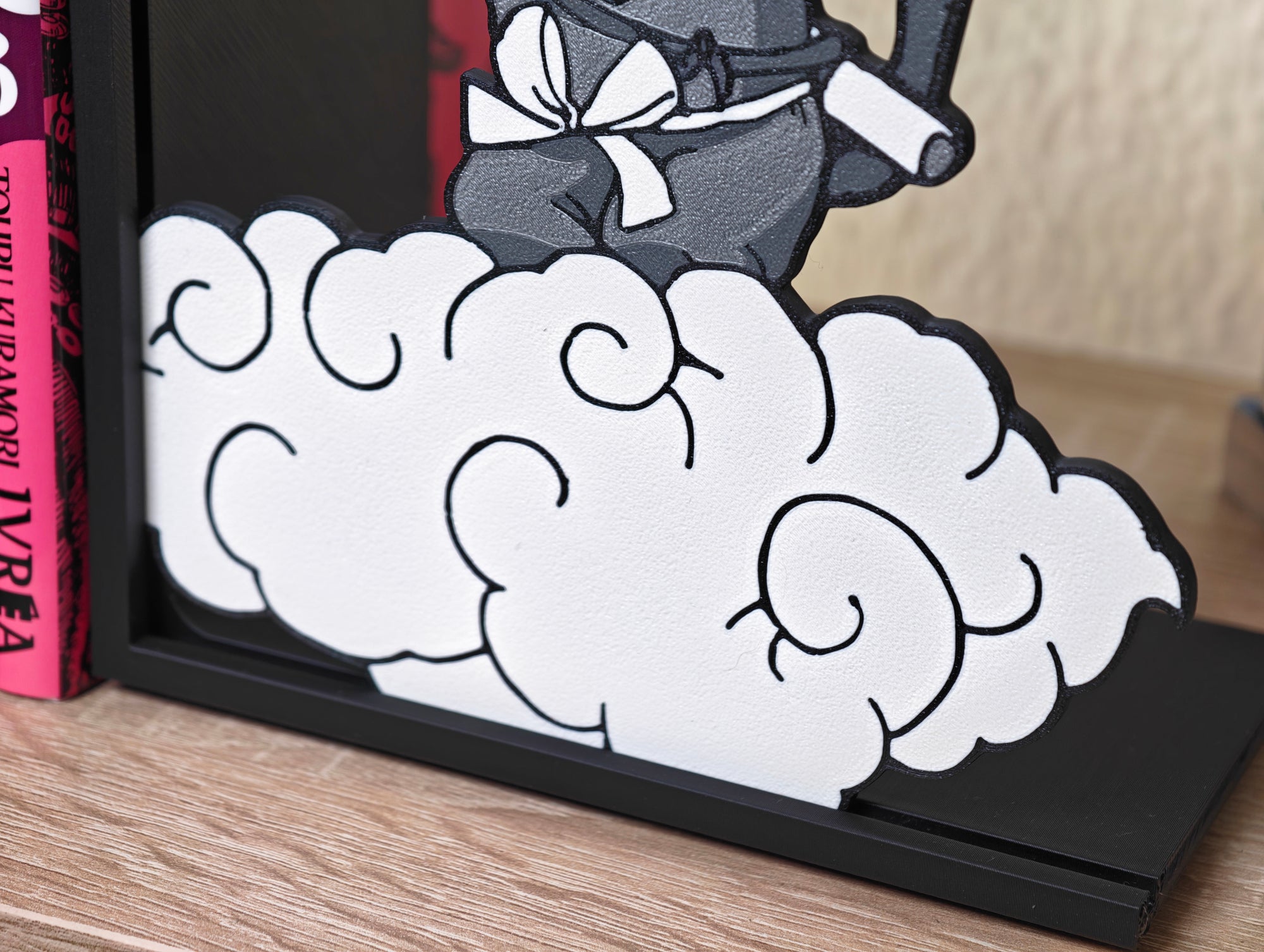 Sujetalibros de Goku en la nube Kinto