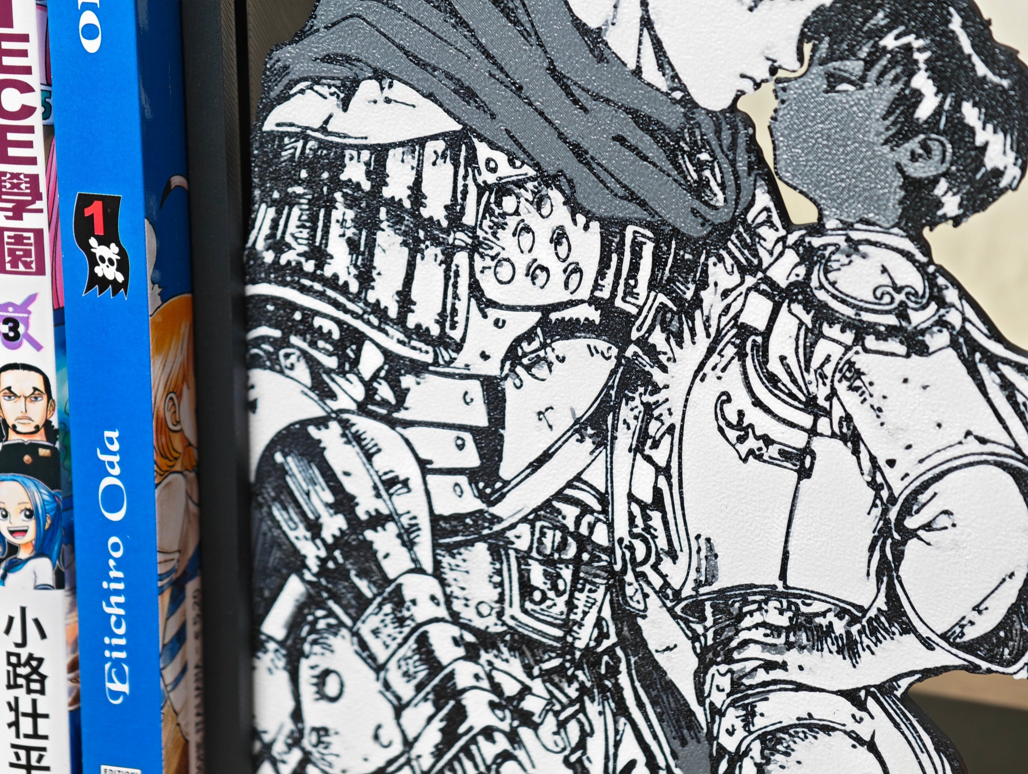 Sujetalibros de Guts y Casca