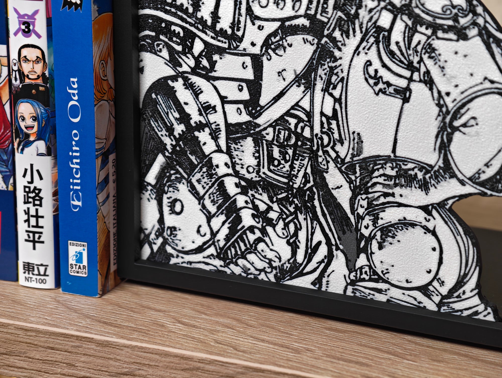 Sujetalibros de Guts y Casca