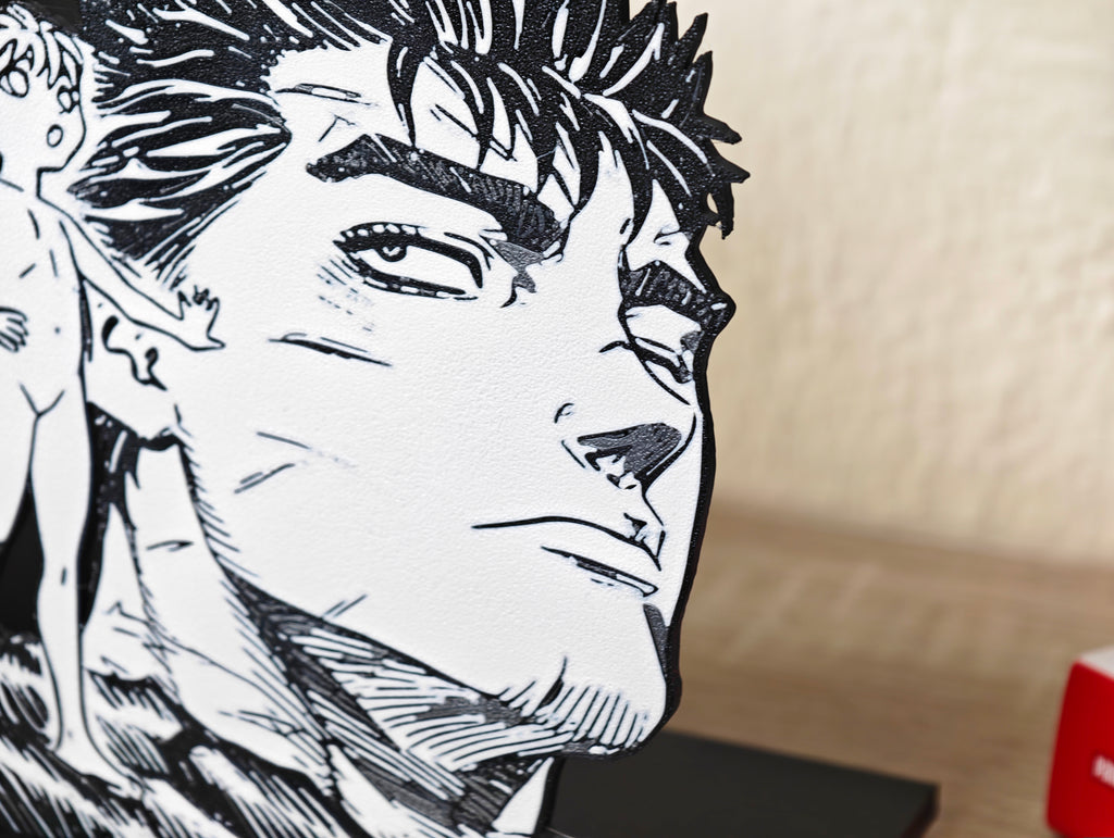 Sujetalibros de Guts y Puck