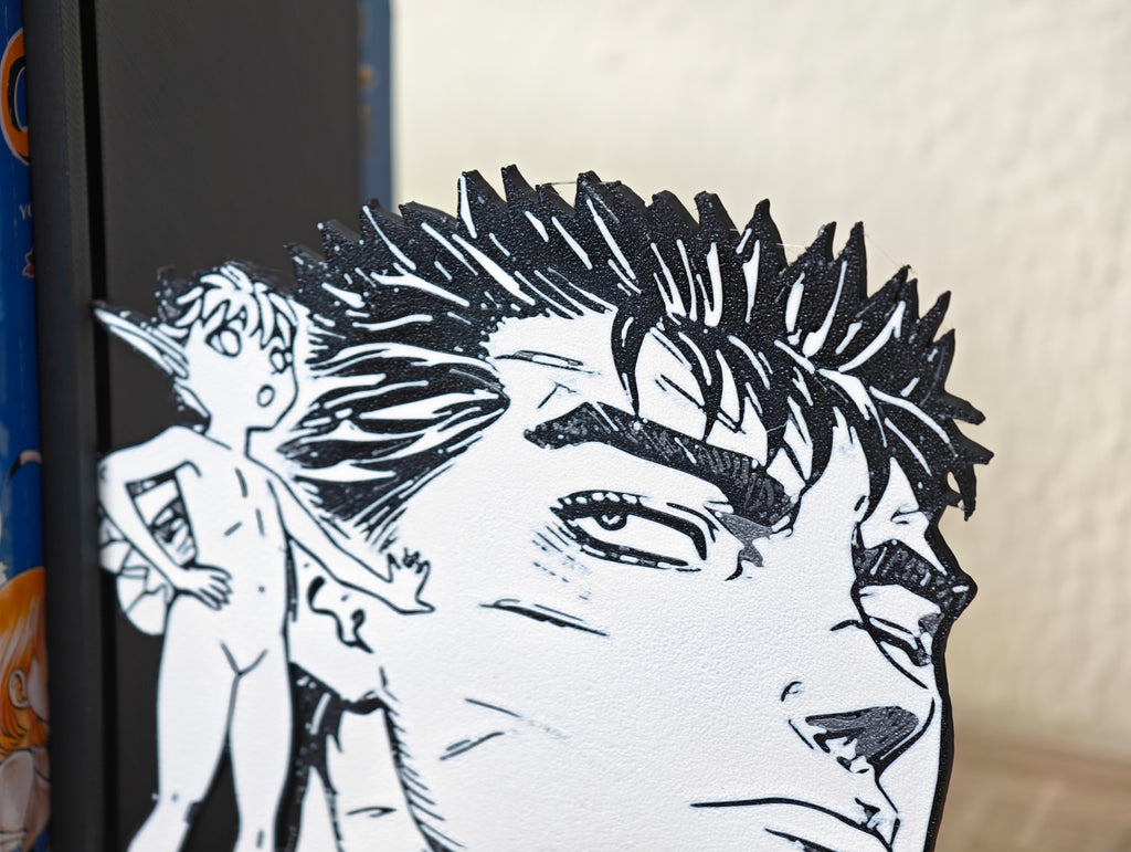 Sujetalibros de Guts y Puck