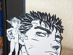 Sujetalibros de Guts y Puck