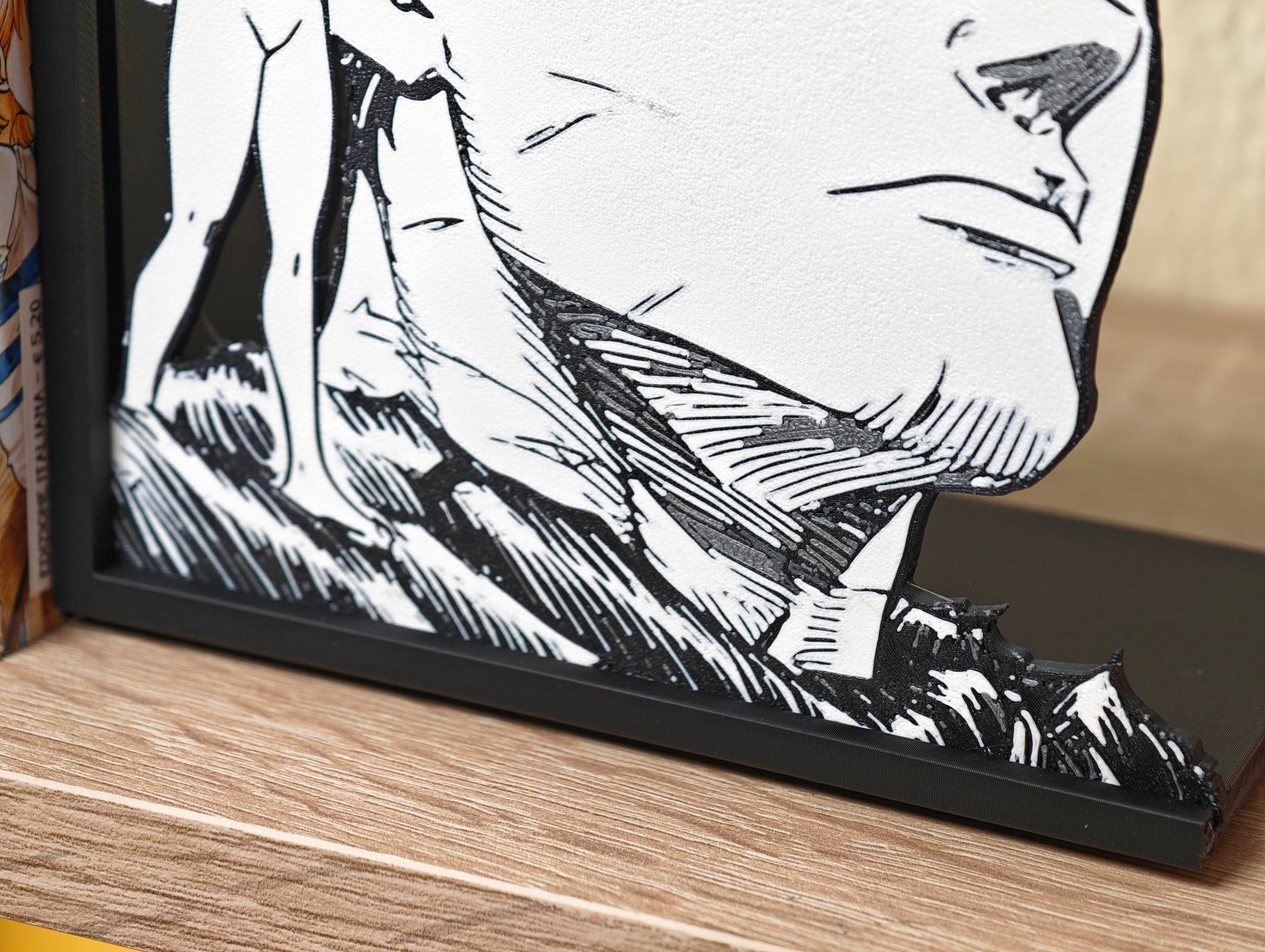 Sujetalibros de Guts y Puck