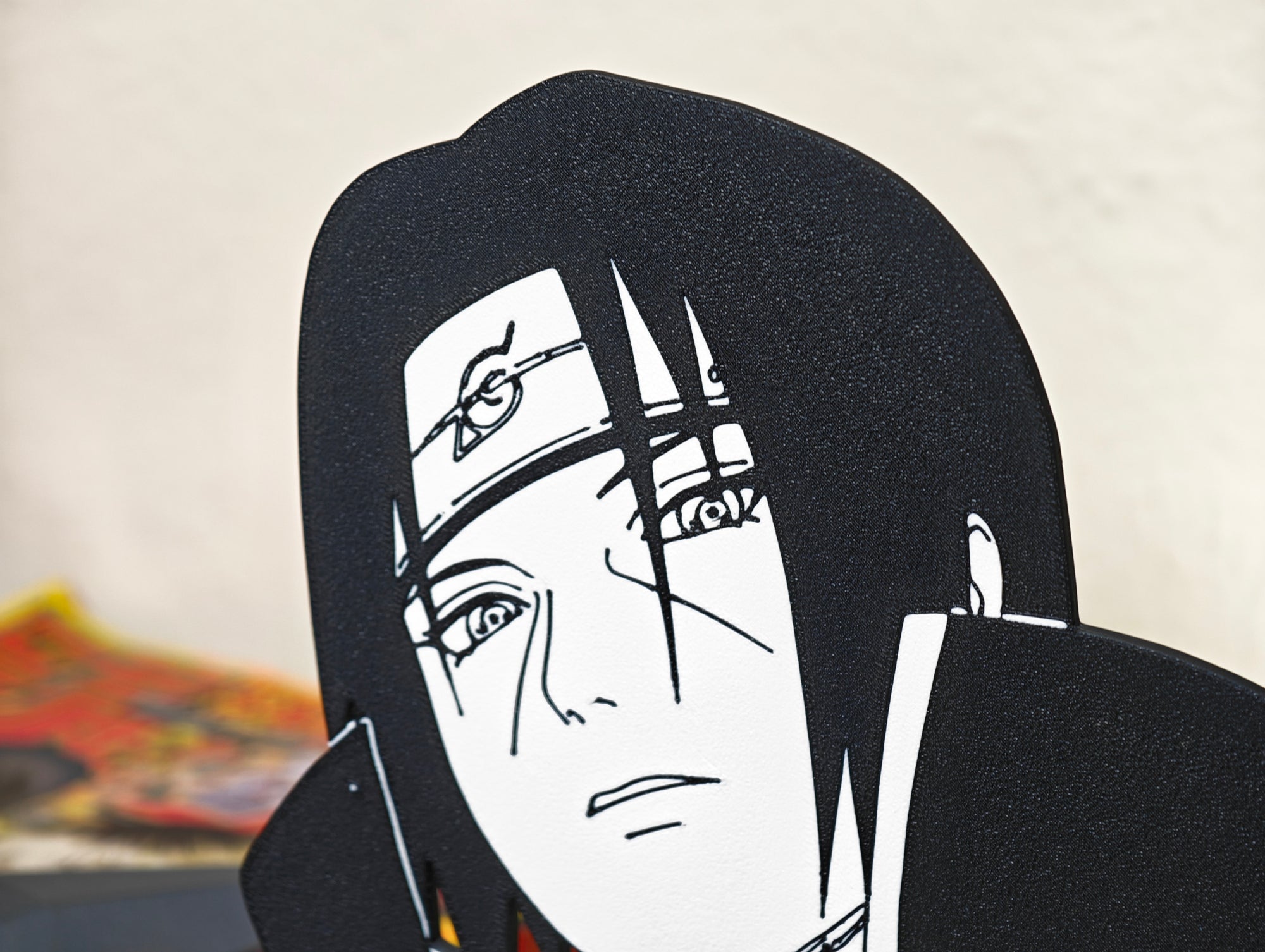 Sujetalibros de Itachi Uchiha