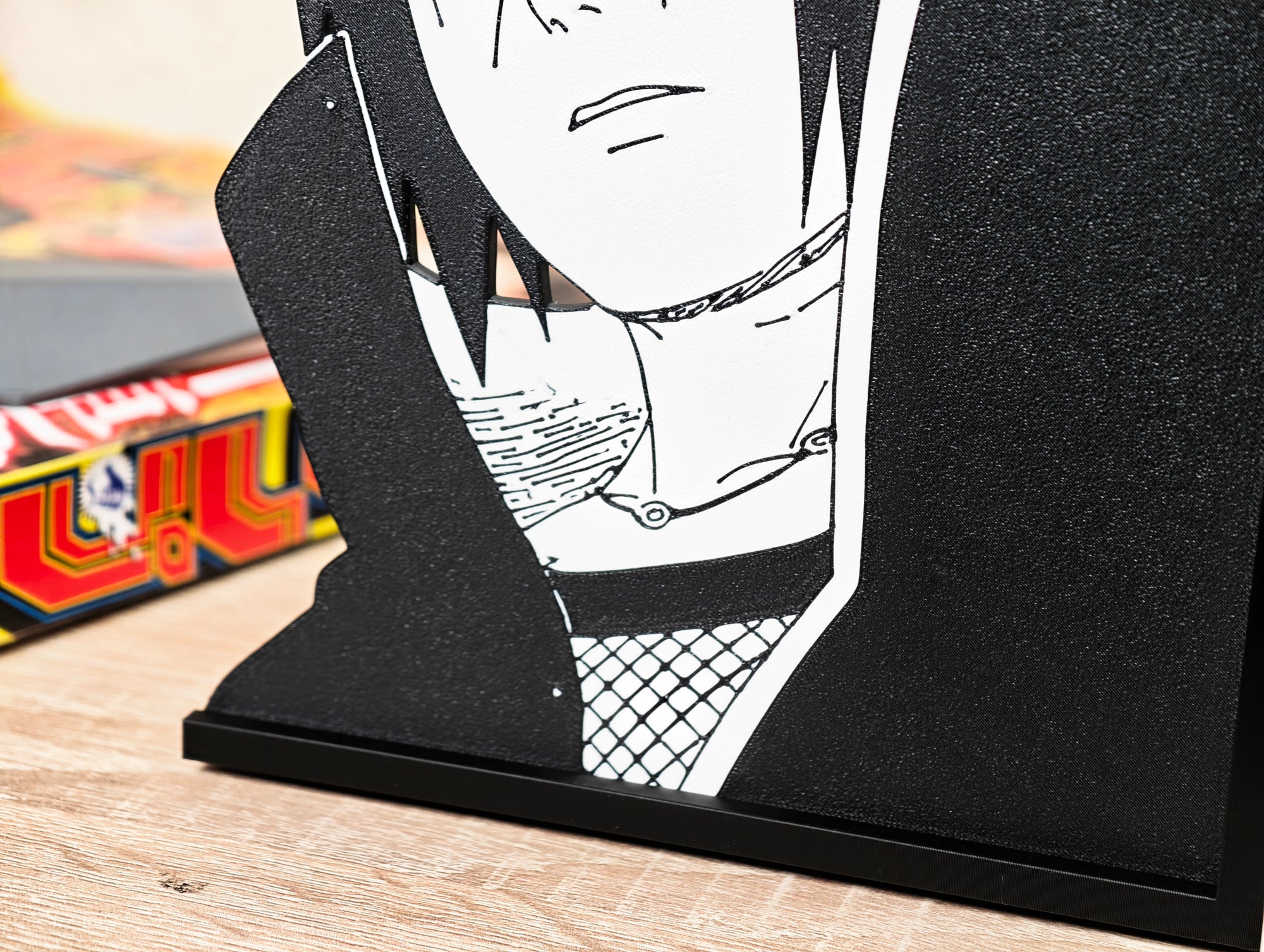 Sujetalibros de Itachi Uchiha