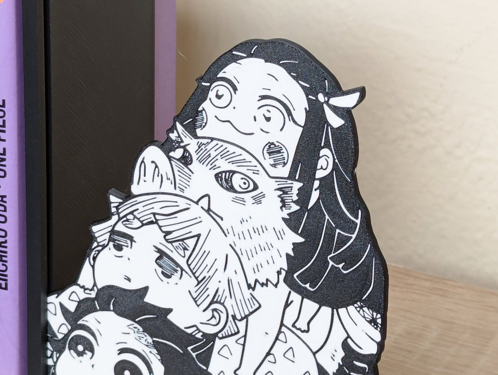Sujetalibros de Tanjiro, Nezuko, Zenitsu e Inosuke