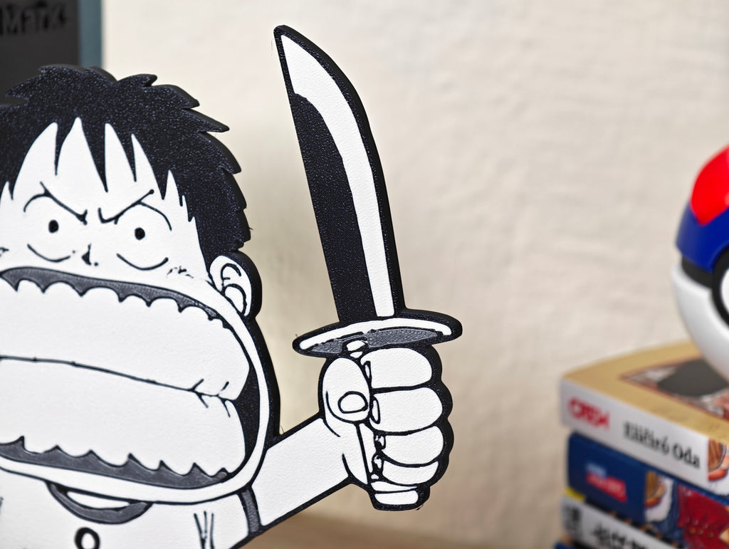 Sujetalibros de Luffy de peque