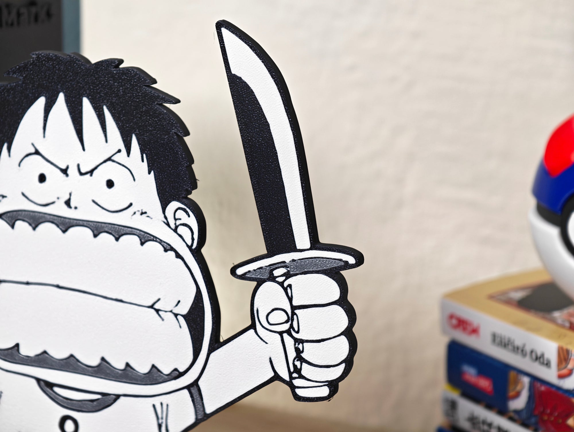 Sujetalibros de Luffy de peque