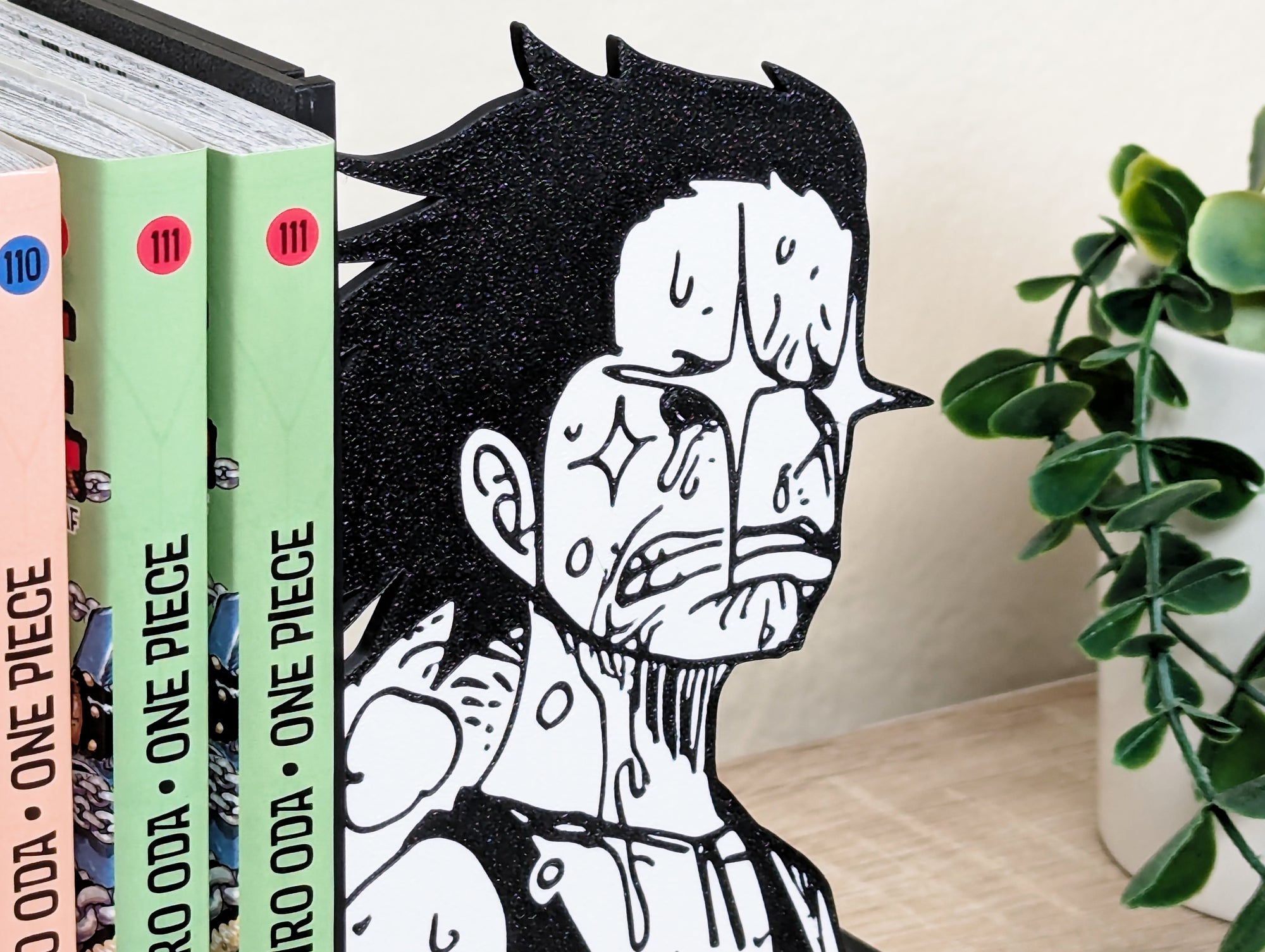 Sujetalibros de Luffy flipando