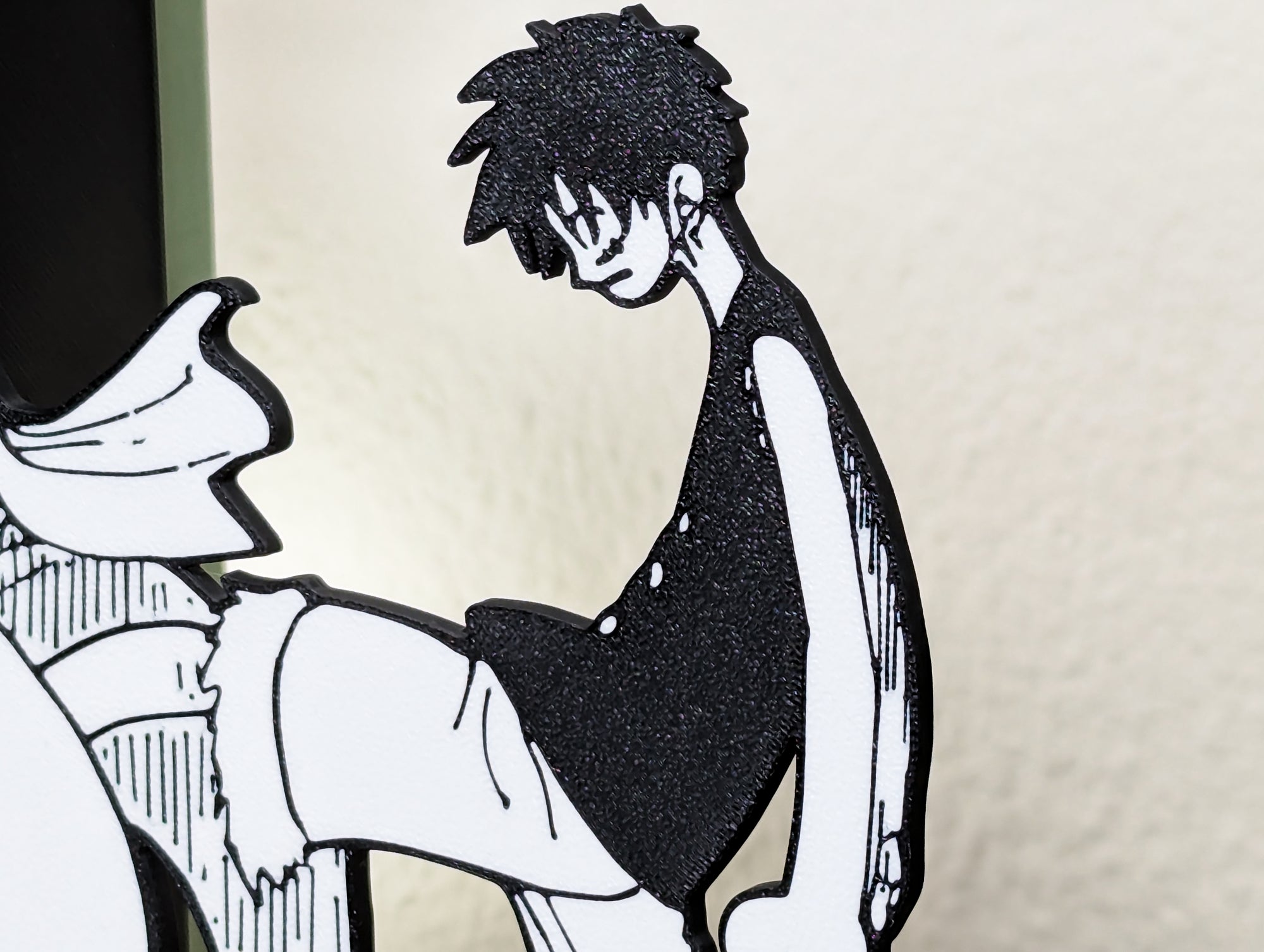 Sujetalibros de Luffy pateando a Buggy