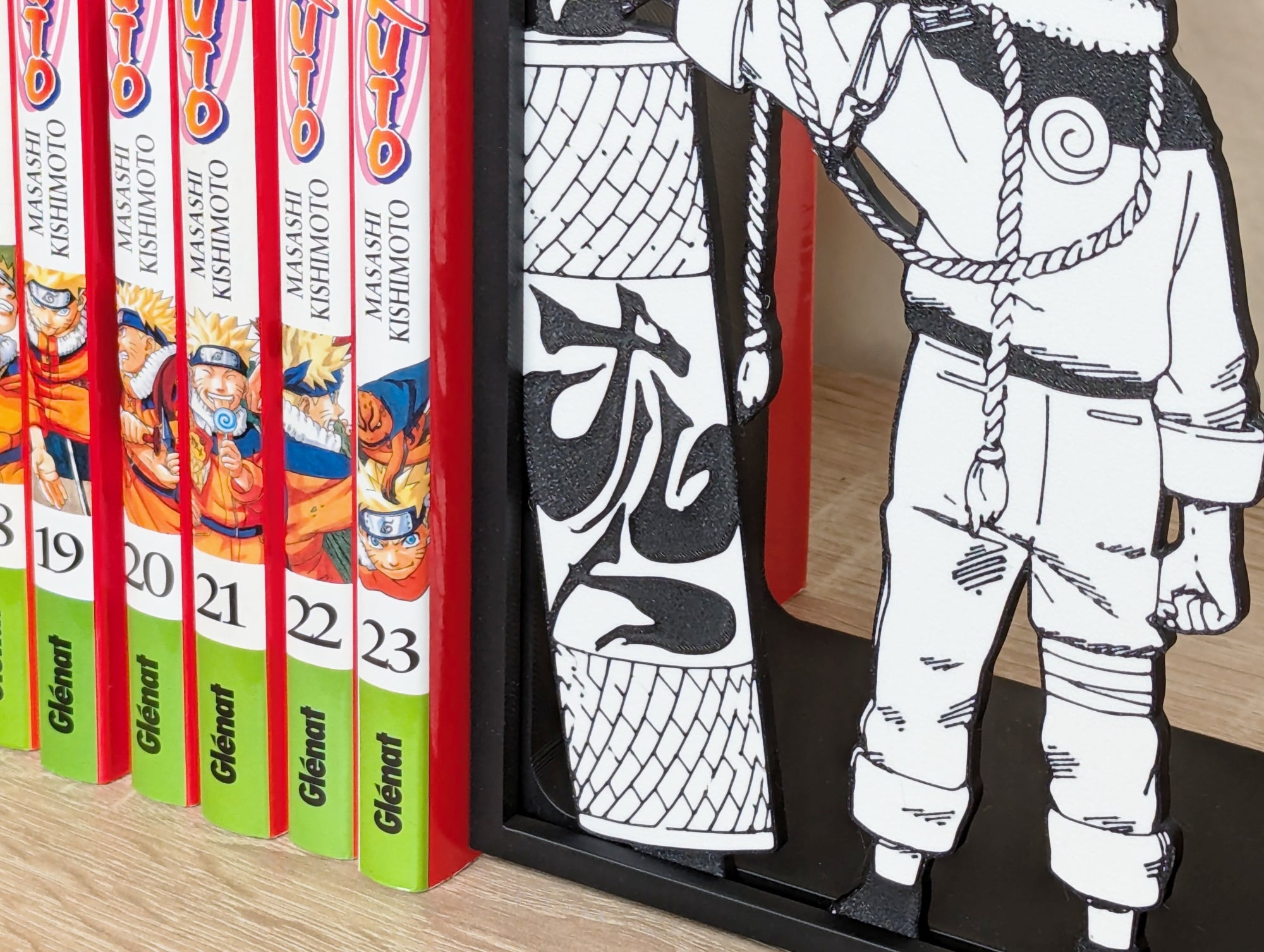 Sujetalibros de Naruto con el pergamino