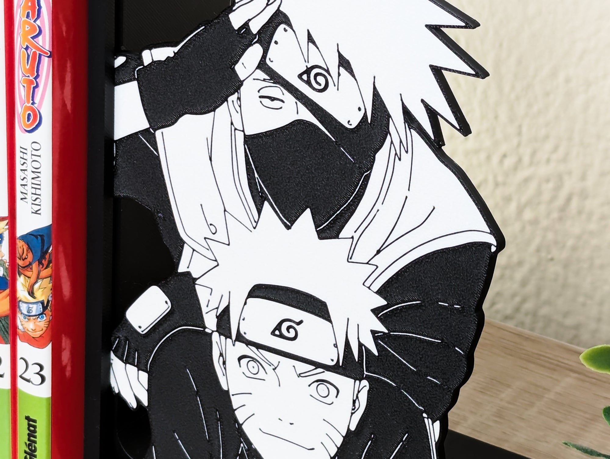 Sujetalibros de Kakashi con Naruto