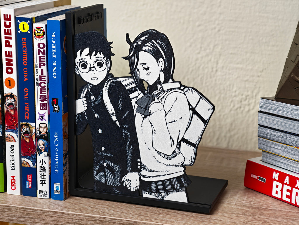 Sujetalibros de Momo y Okarun de la mano