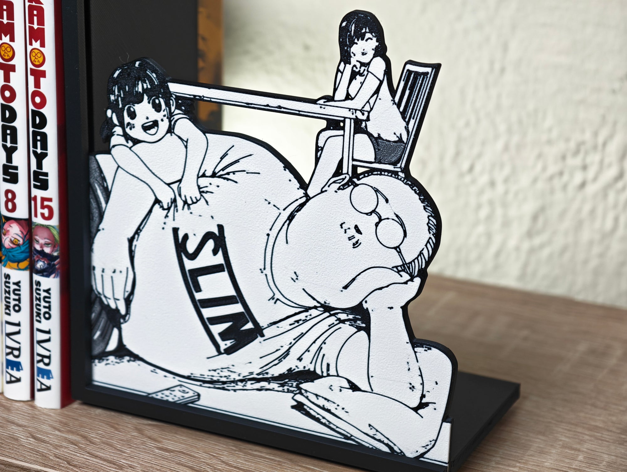 Sujetalibros de Sakamoto y su familia