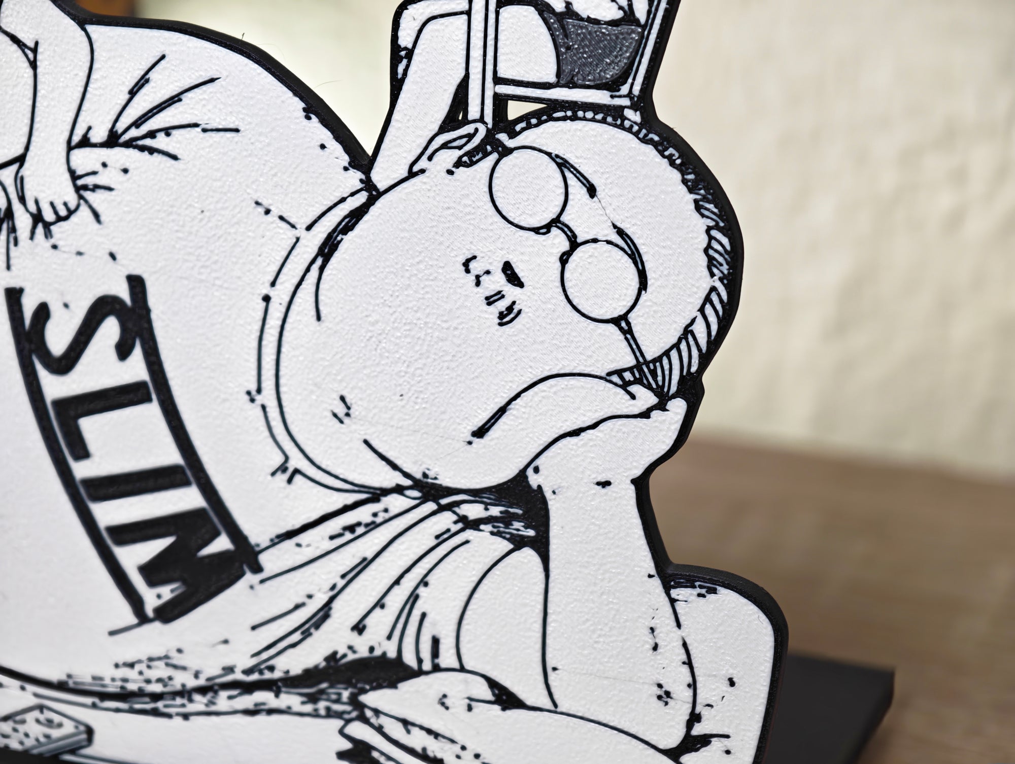 Sujetalibros de Sakamoto y su familia