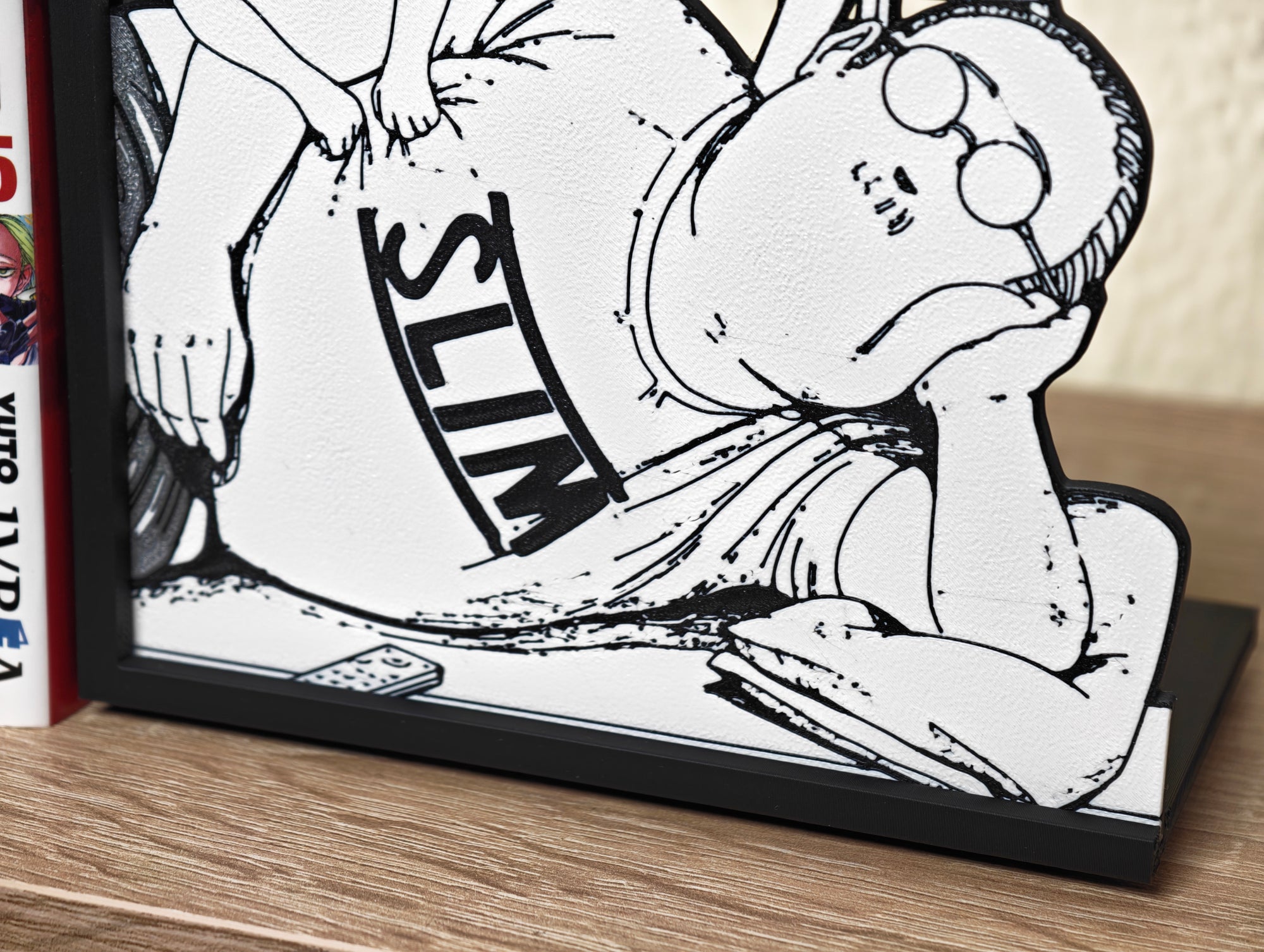 Sujetalibros de Sakamoto y su familia