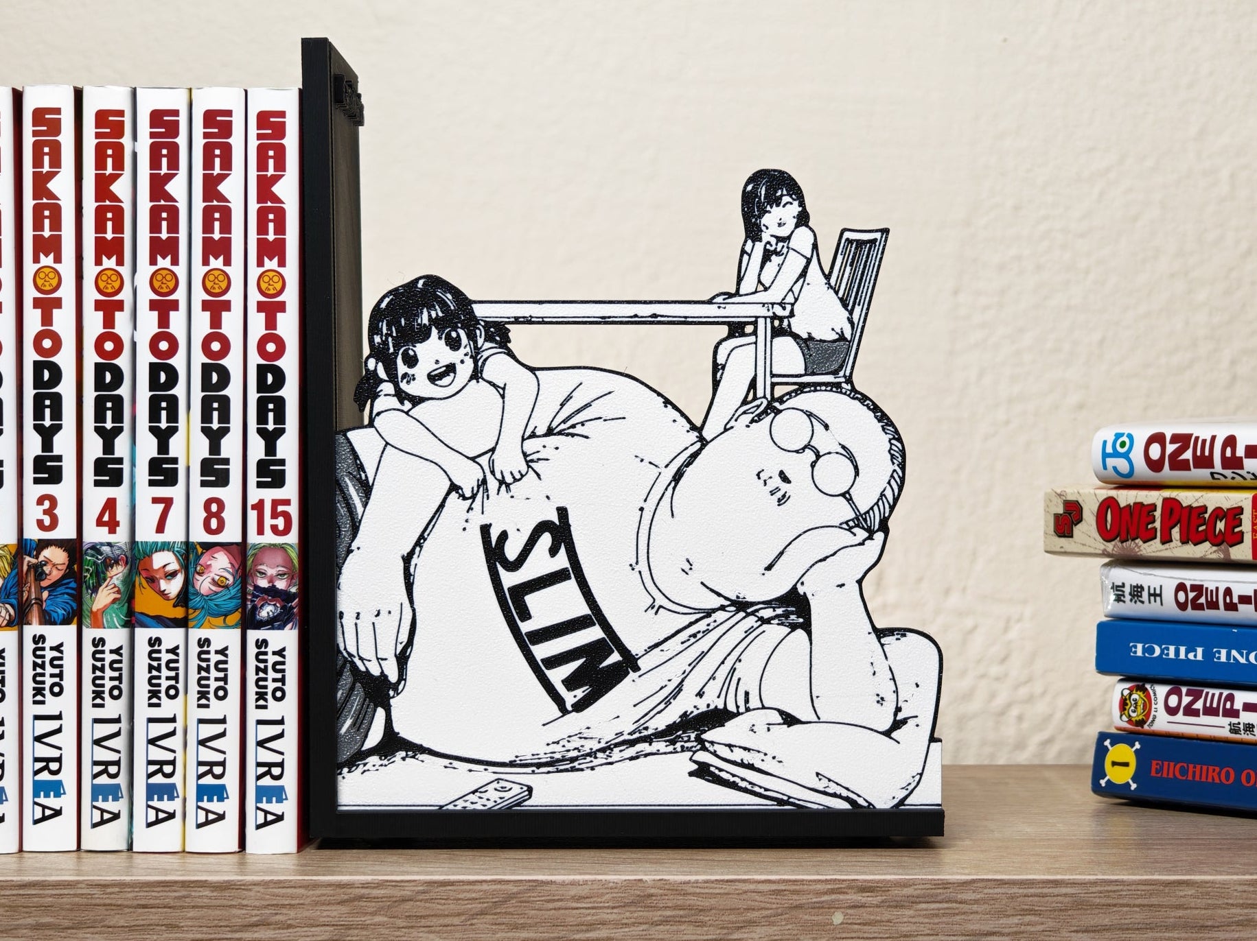 Sujetalibros de Sakamoto y su familia