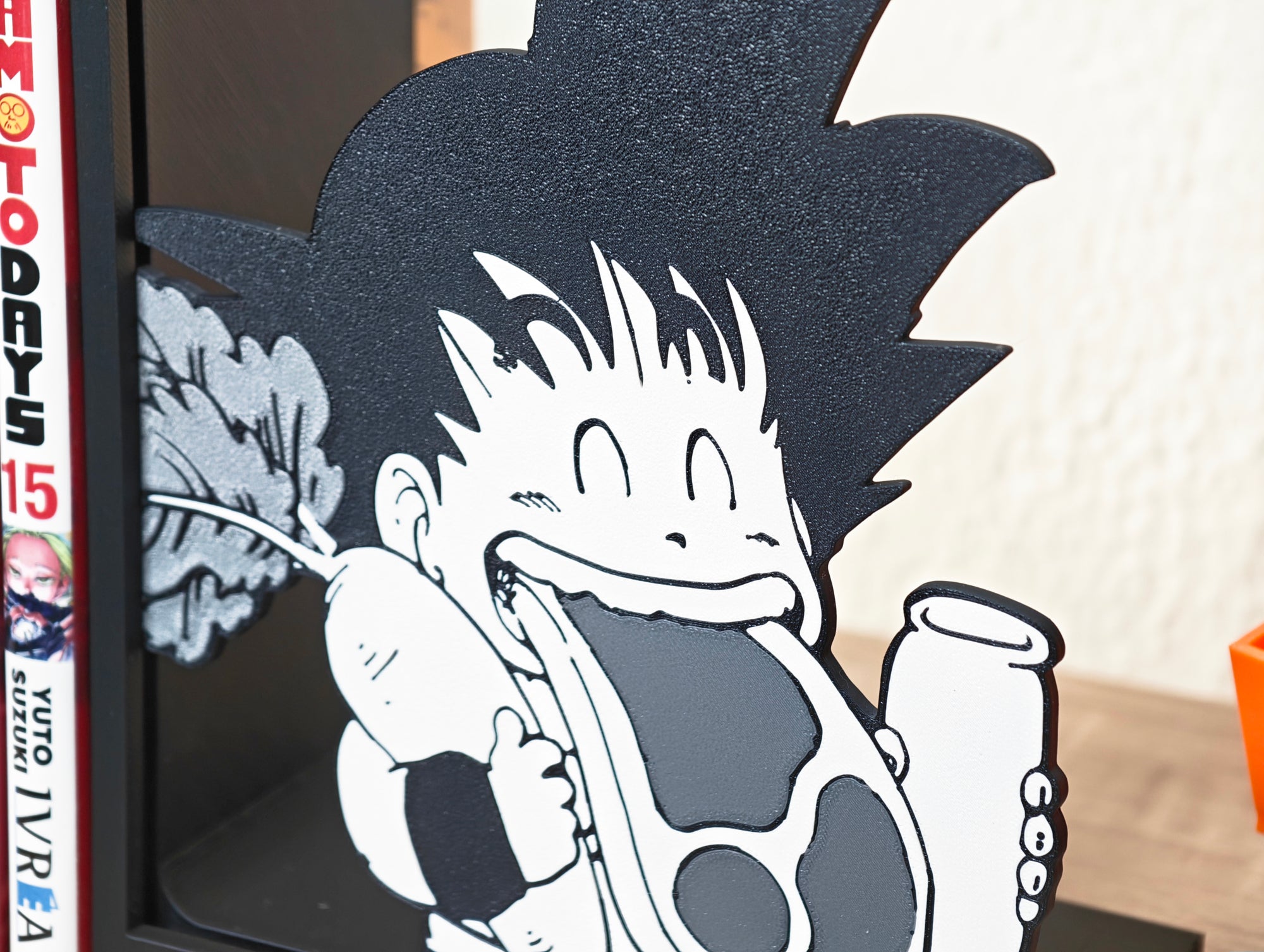 Sujetalibros de Son Goku comiendo