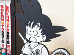 Sujetalibros de Goku flipando con tu biblioteca