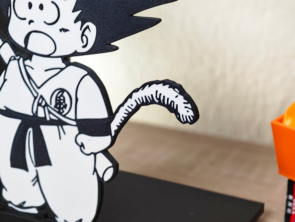 Sujetalibros de Goku flipando con tu biblioteca