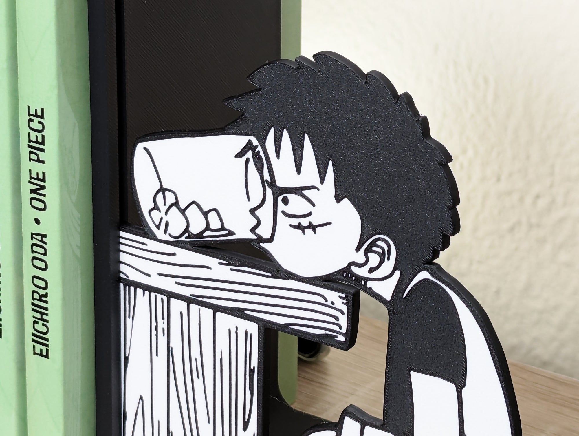 Sujetalibros de Luffy en Villa Foosha