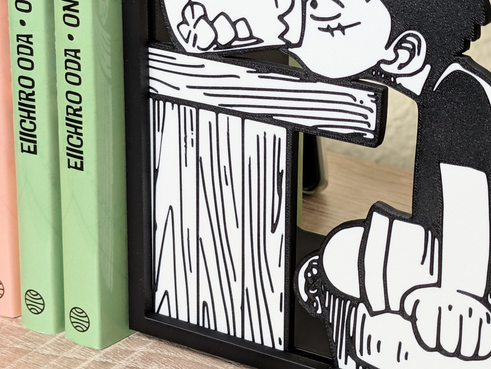 Sujetalibros de Luffy en Villa Foosha