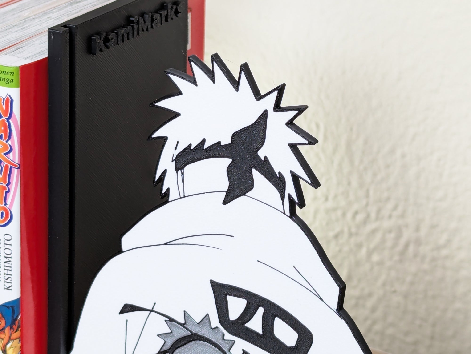 Sujetalibros de Naruto Hogake