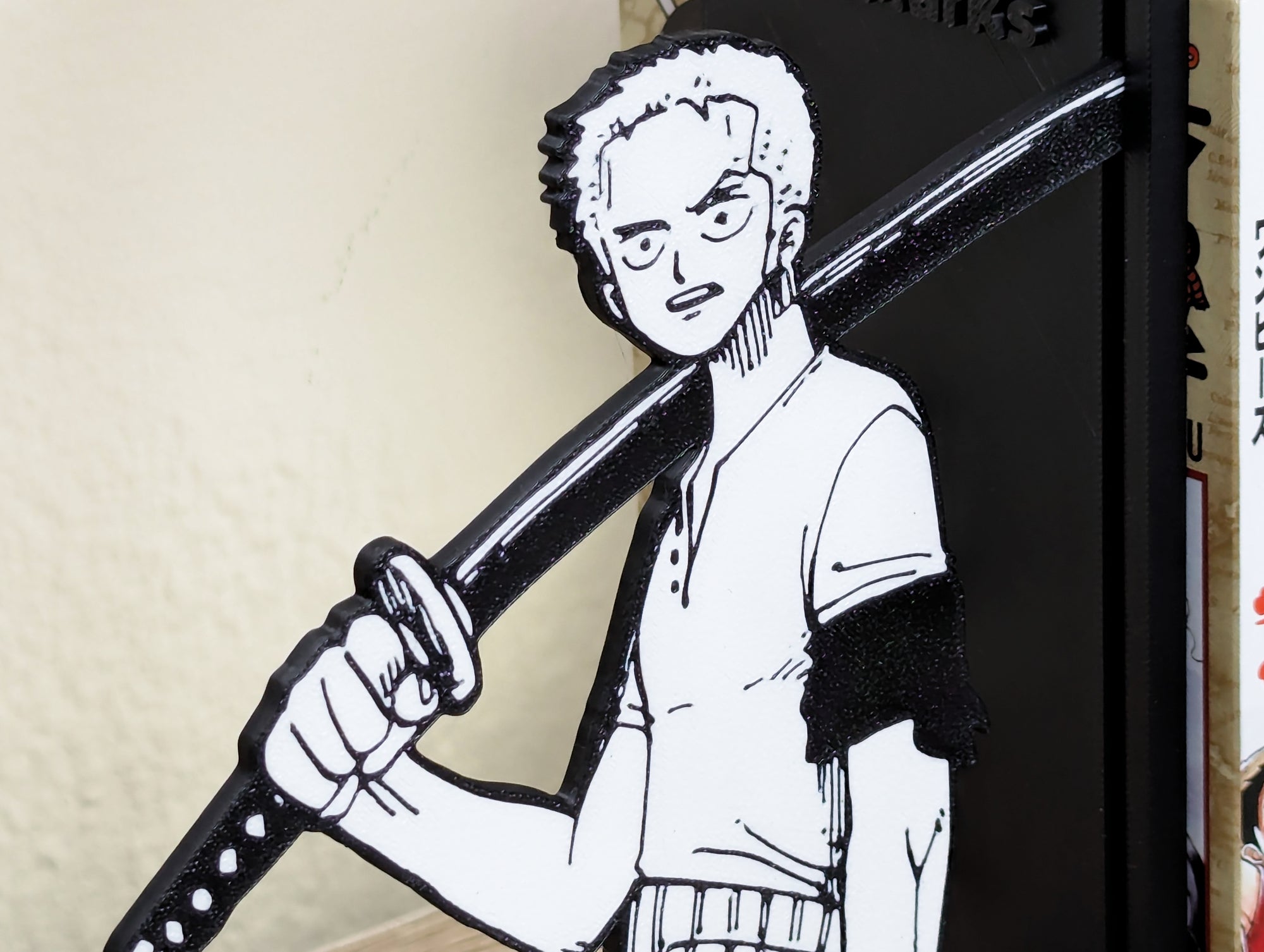 Sujetalibros de Zoro con las katanas