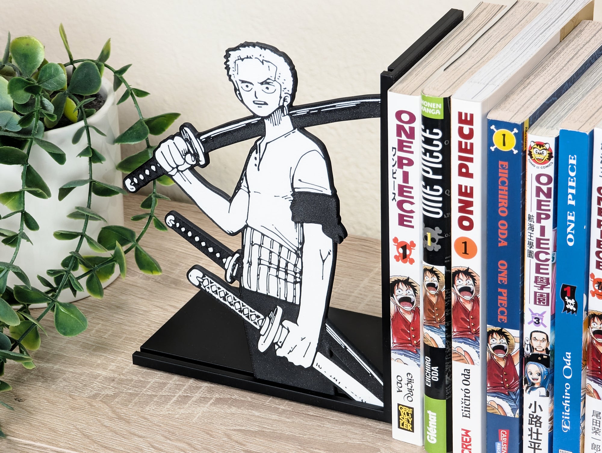 Sujetalibros de Zoro con las katanas