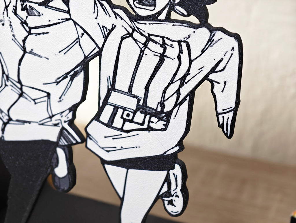 Sujetalibros de Momo y Okarun corriendo