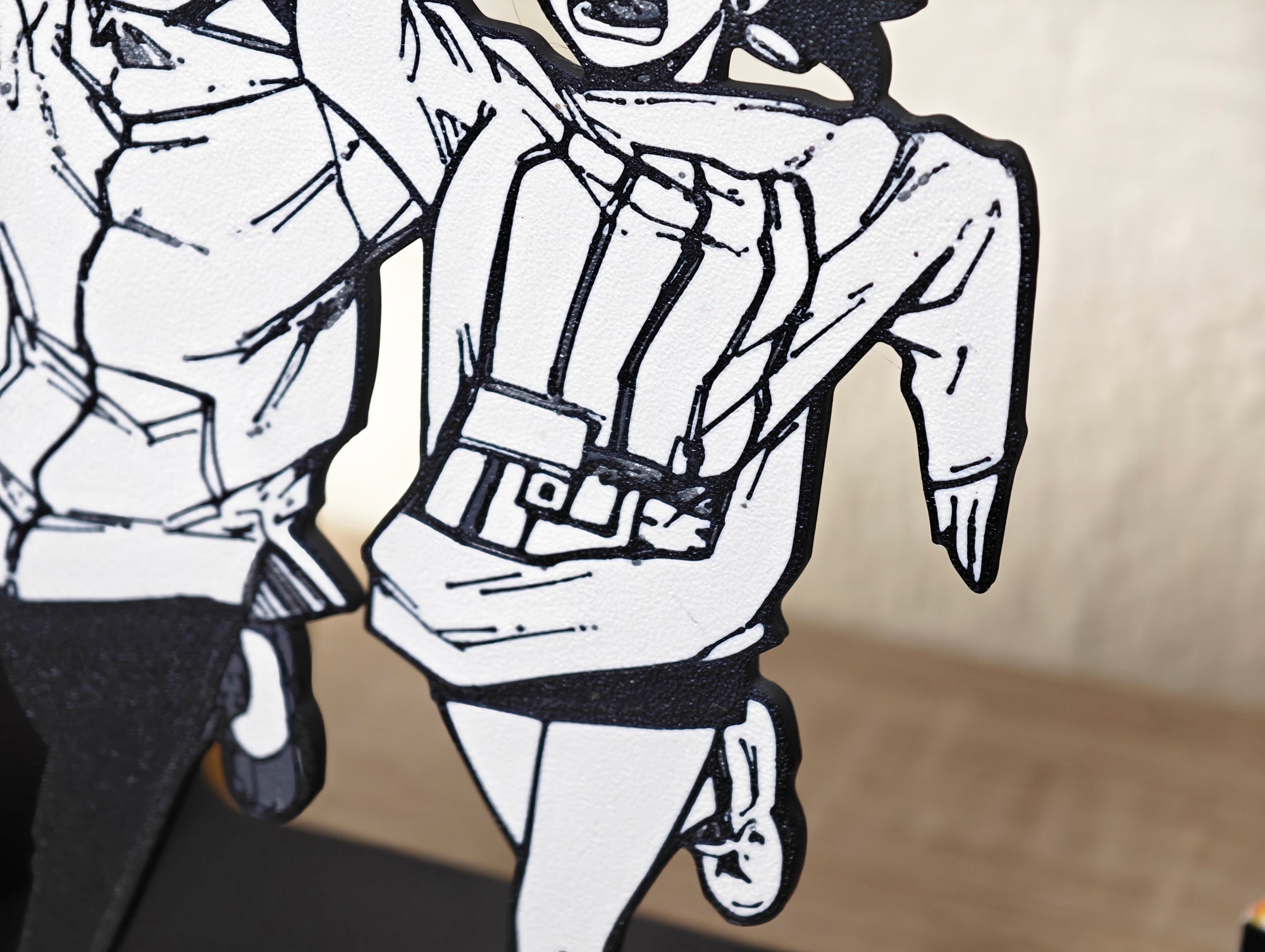 Sujetalibros de Momo y Okarun corriendo