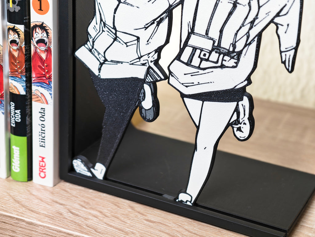 Sujetalibros de Momo y Okarun corriendo