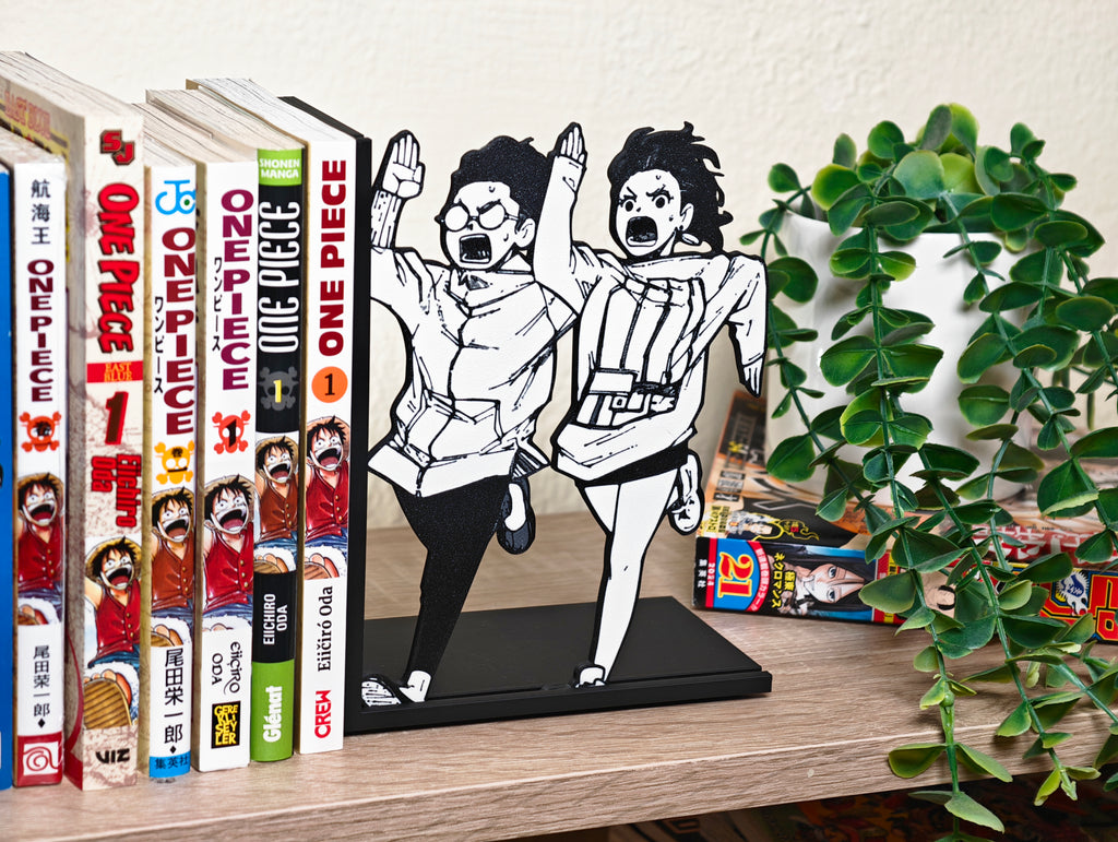 Sujetalibros de Momo y Okarun corriendo