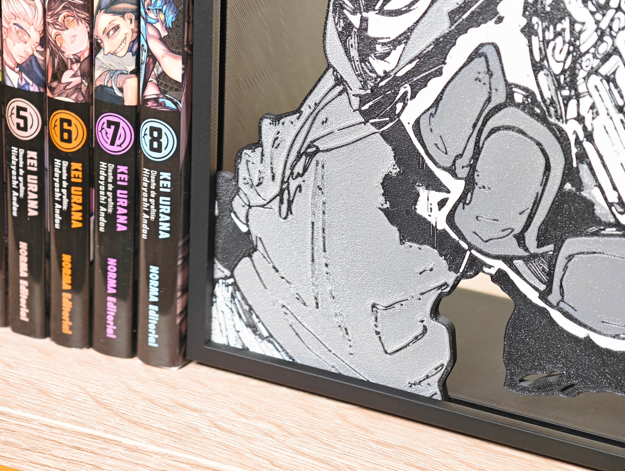 Sujetalibros de Rudo con el amuleto