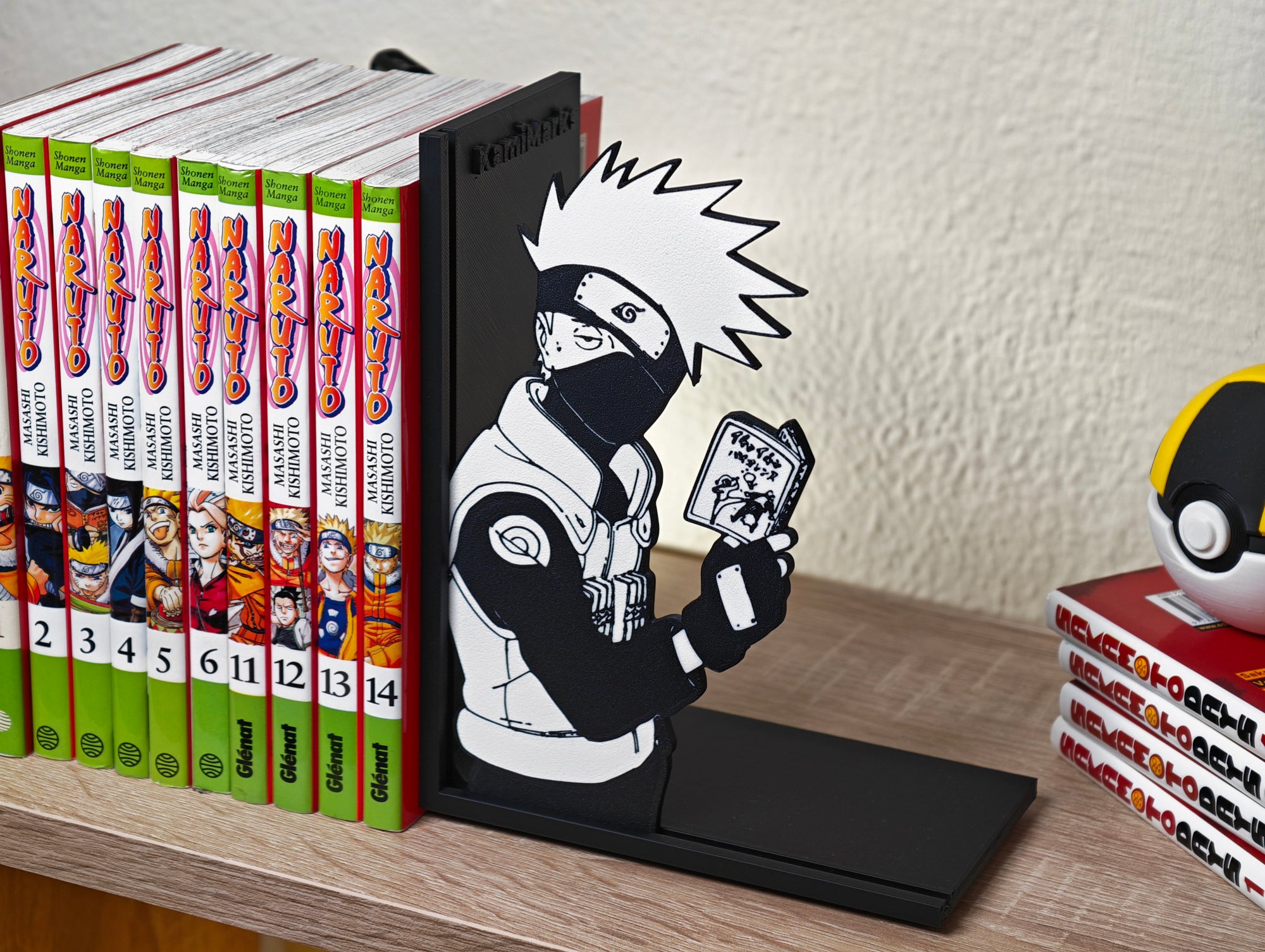 Sujetalibros de Kakashi leyendo