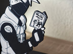 Sujetalibros de Kakashi leyendo
