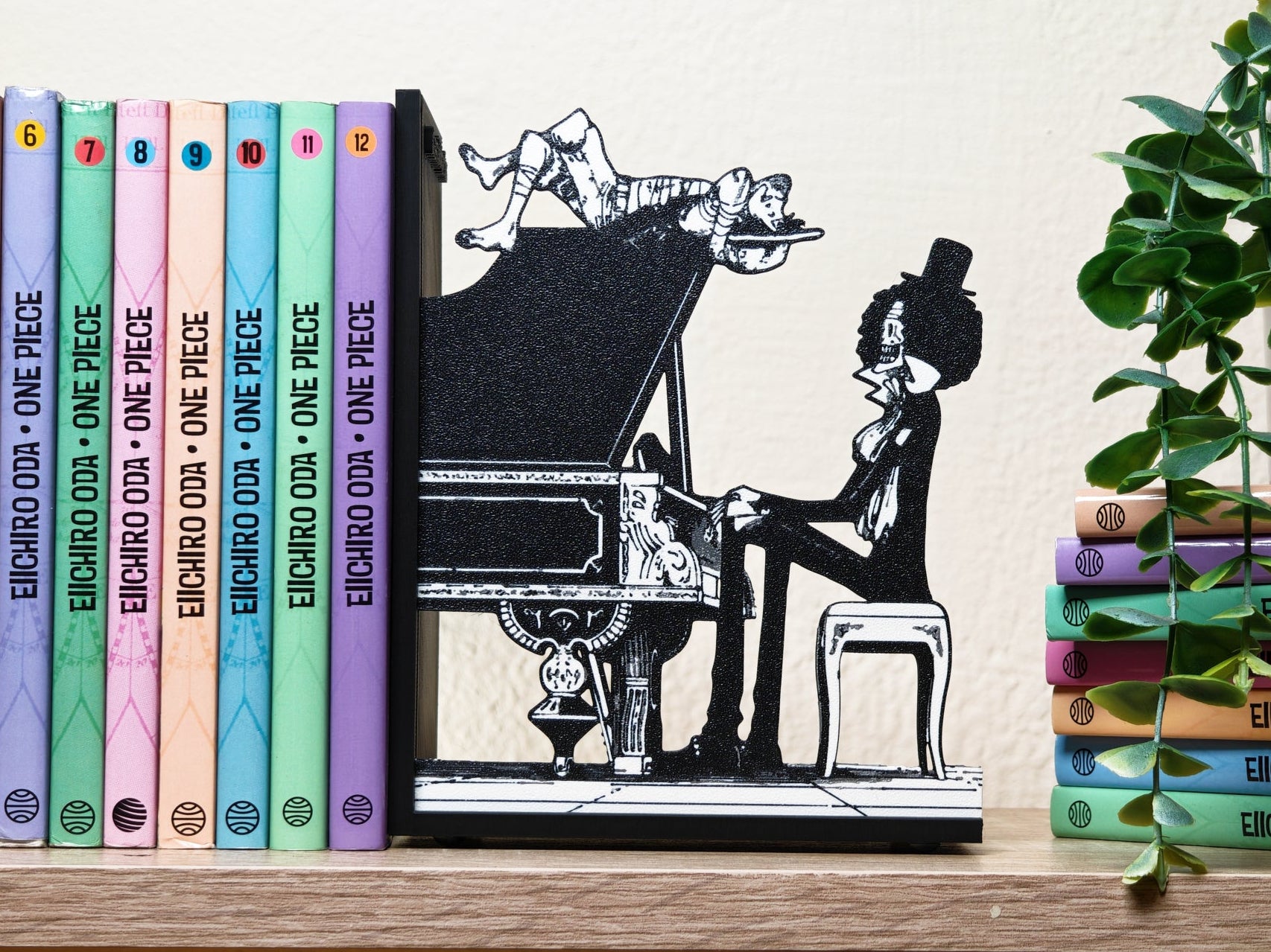 Sujetalibros de Luffy y Brook cantando el Sake de Binks