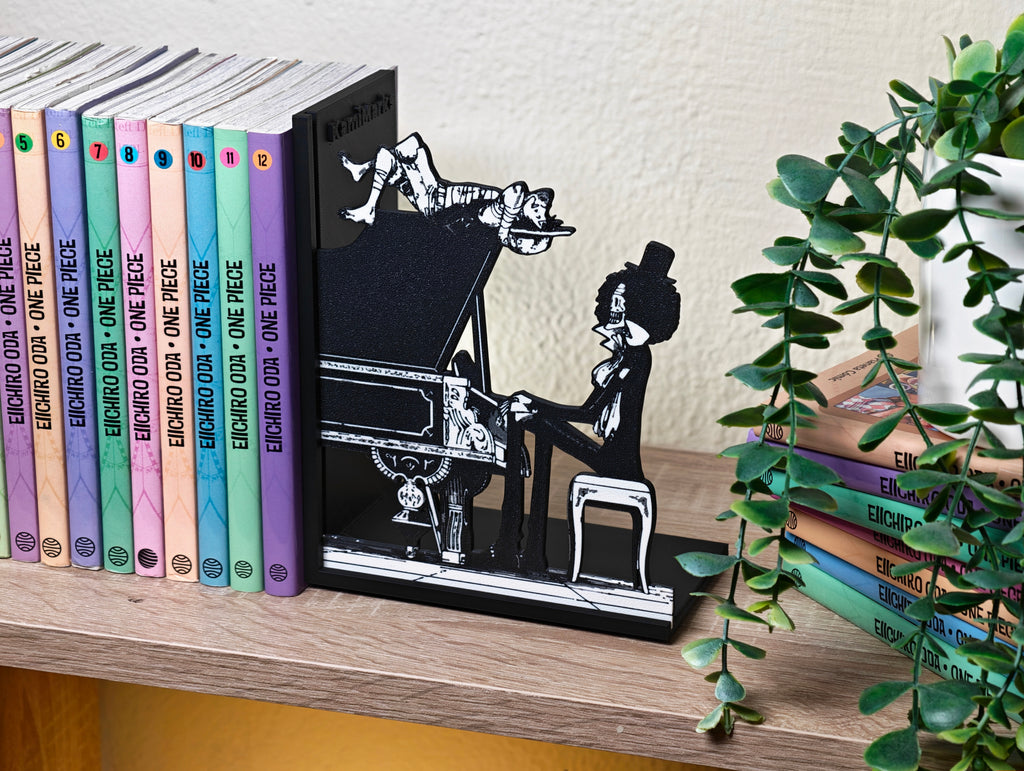 Sujetalibros de Luffy y Brook cantando el Sake de Binks