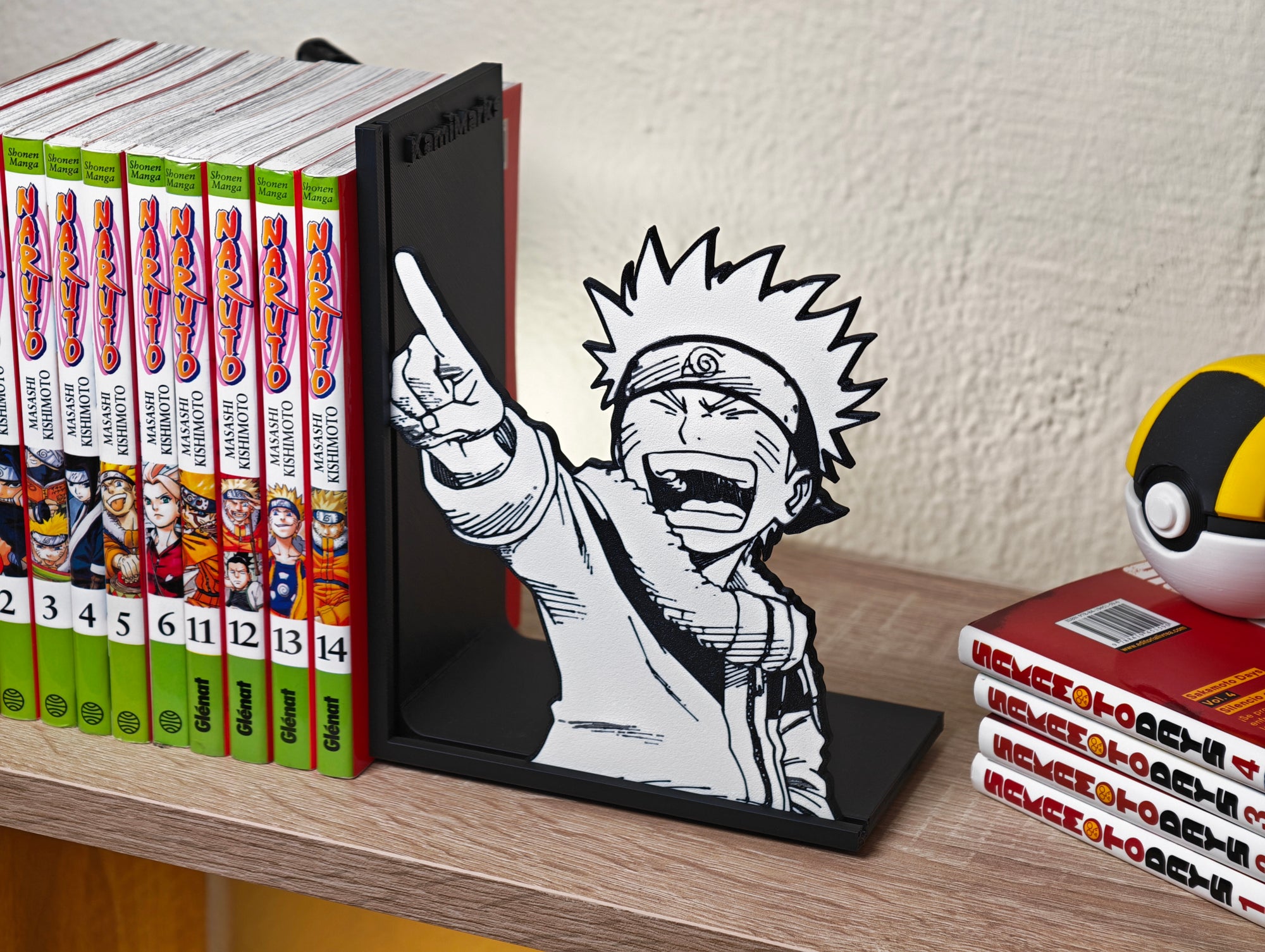 Sujetalibros de Naruto riéndose