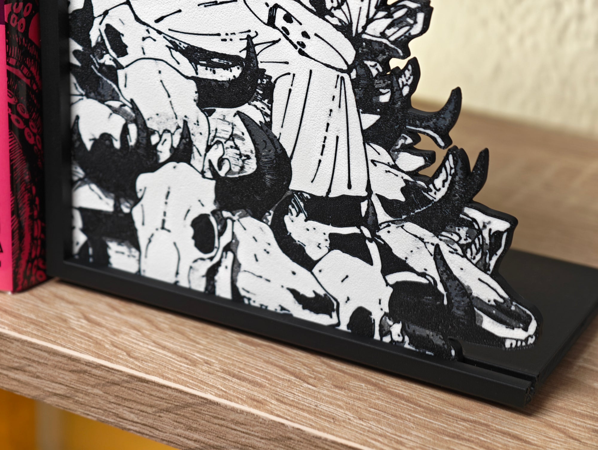 Sujetalibros de Sukuna en el relicario