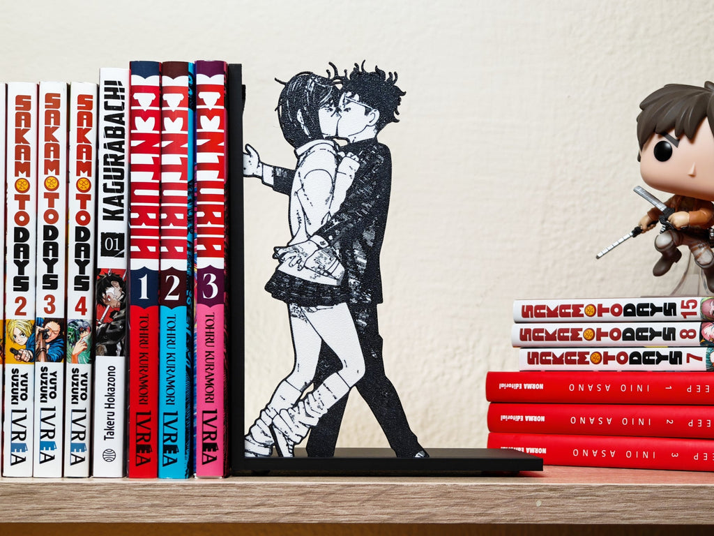 Sujetalibros del beso de Momo y Okarun