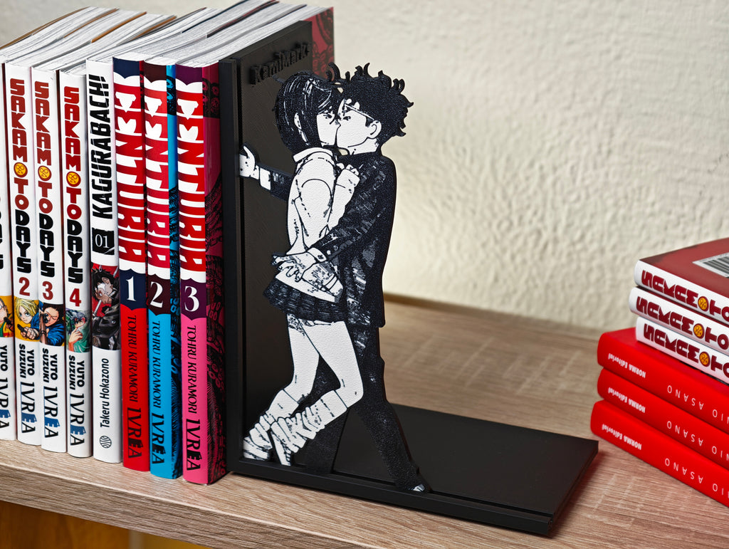 Sujetalibros del beso de Momo y Okarun